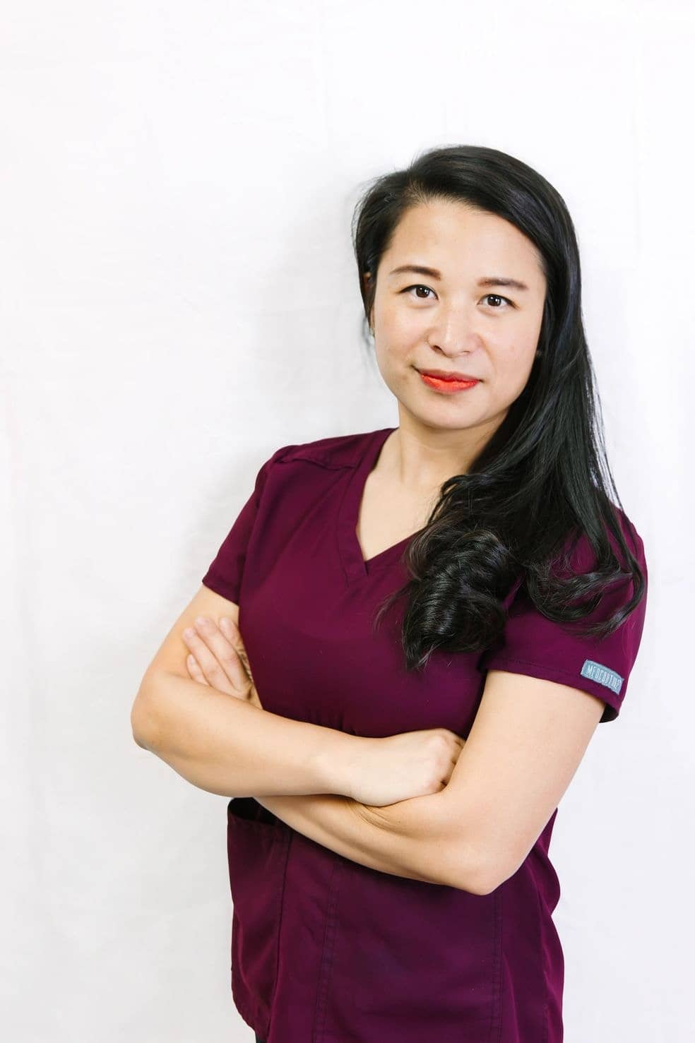 Margarita Jiang standing against a clean white background